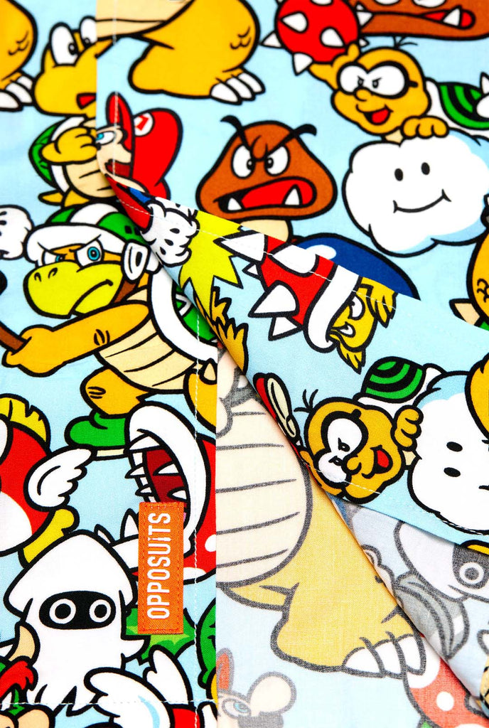 Man wearing Hawaiian shirt with Super Mario Icons