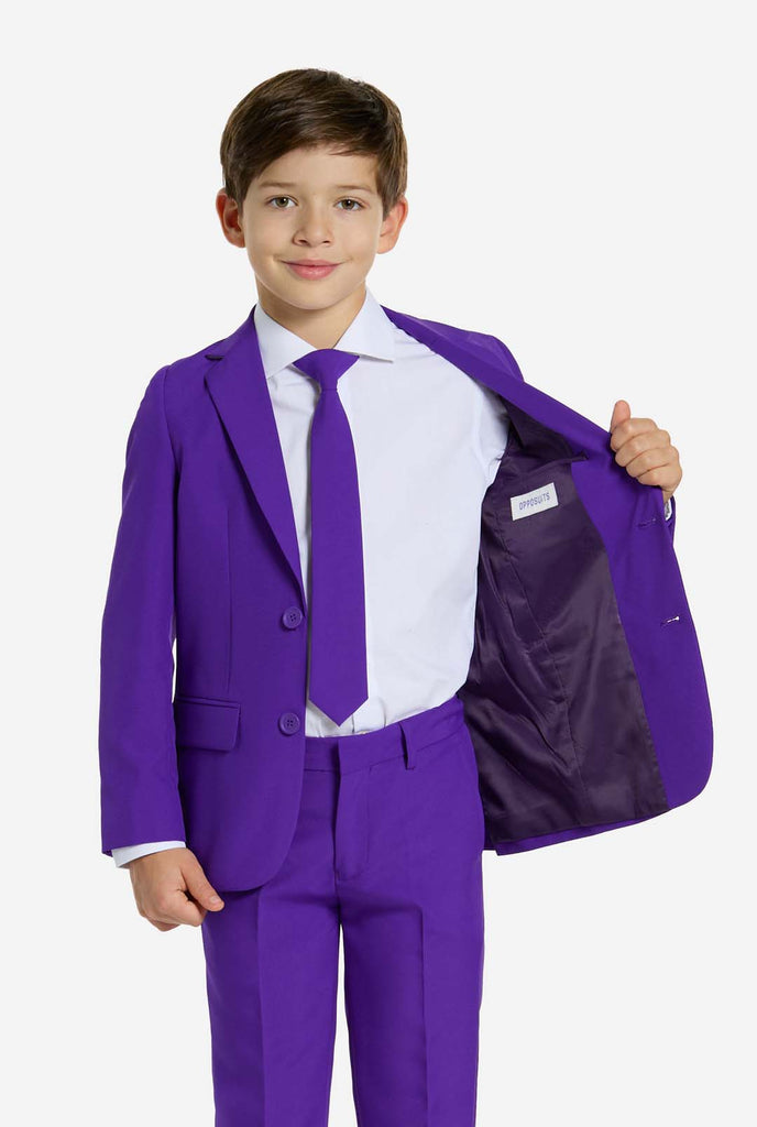 Kid wearing purple boys suit.