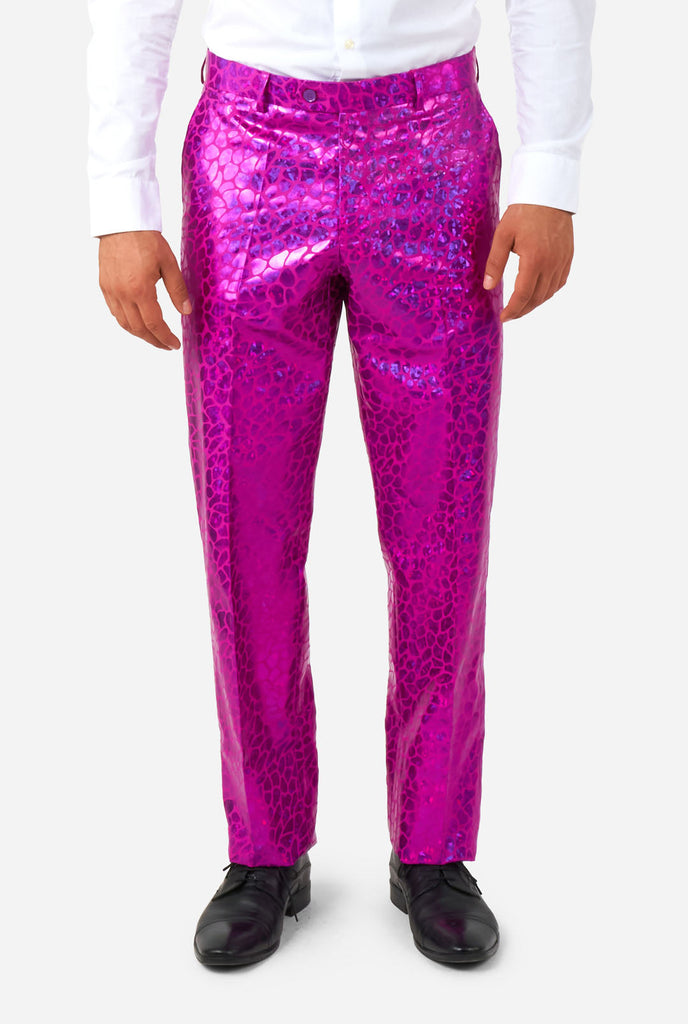 Man wearing shiny pink lizard skin men's suit, pants view