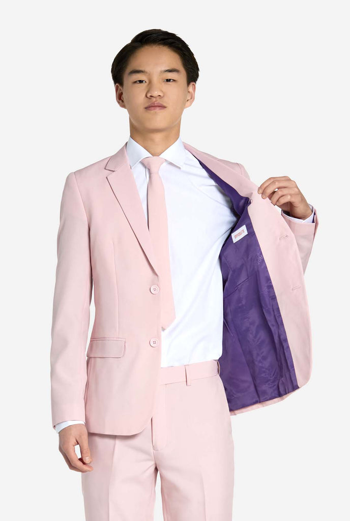 Teen wearing soft pink teen boys suit.