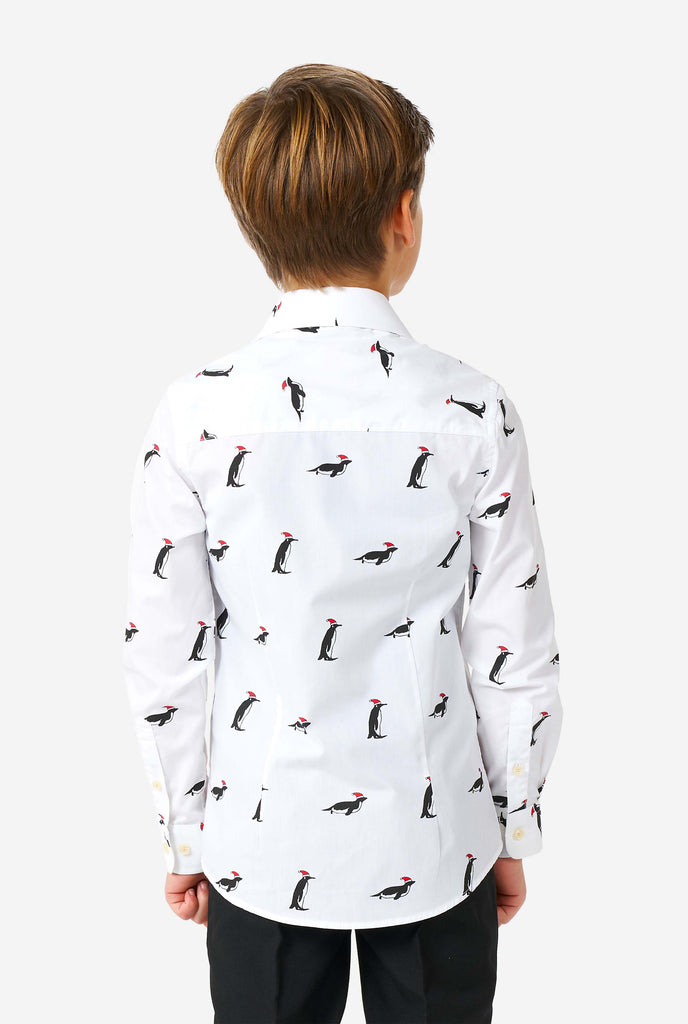  White Christmas dress shirt with Christmas penguins worn by a boy view from the back