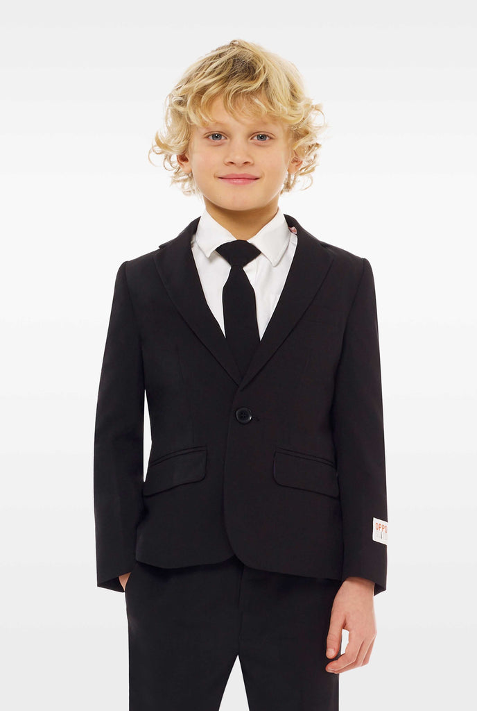 Black suit for boys worn by boy