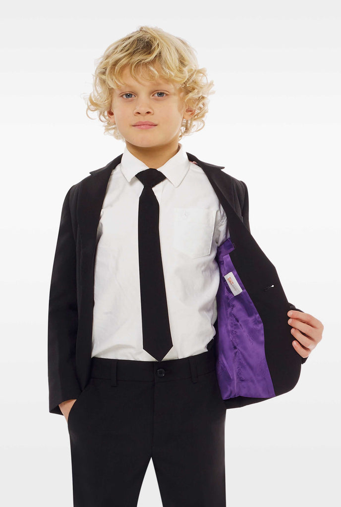 Black suit for boys worn by boy