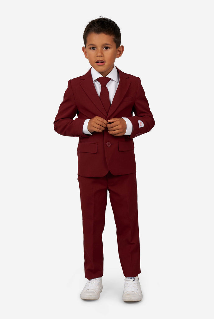 Kid wearing a burgundy red suit for boys