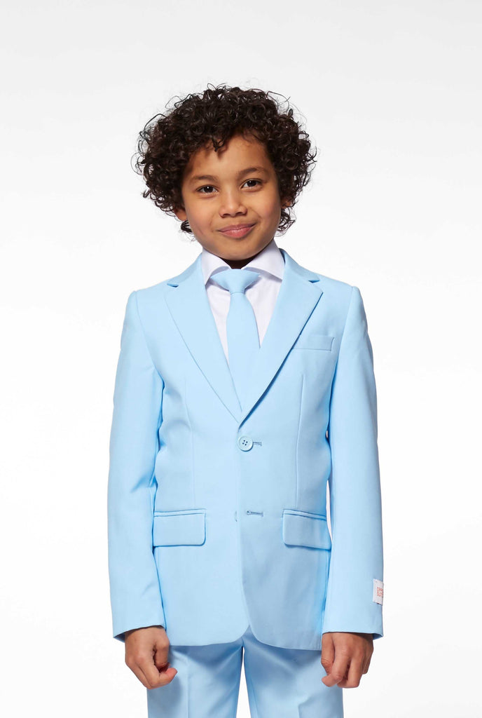 Solid colored light blue suit worn by boy