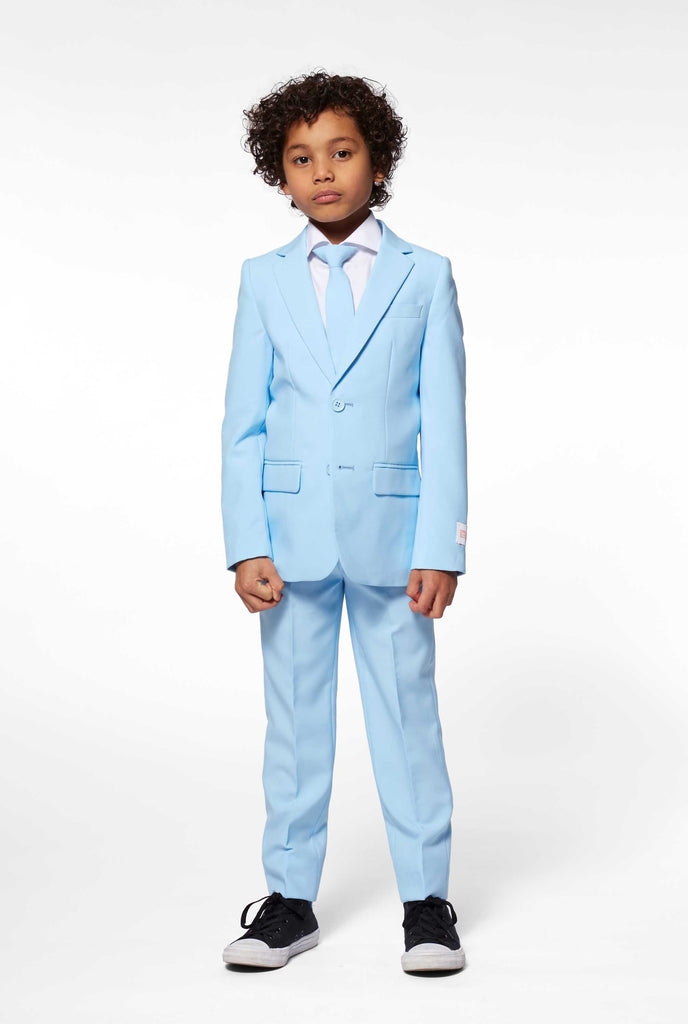 Solid colored light blue suit worn by boy