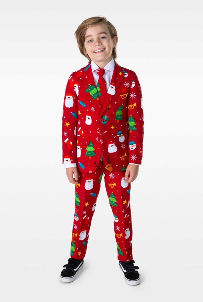 Kid wearing red Christmas suit with Christmas icons