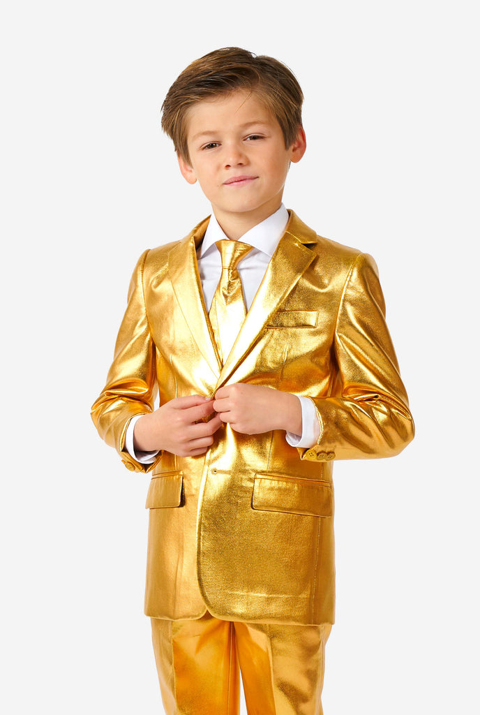 Boy wearing shining gold suit