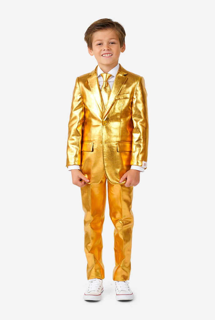 Boy wearing shining gold suit