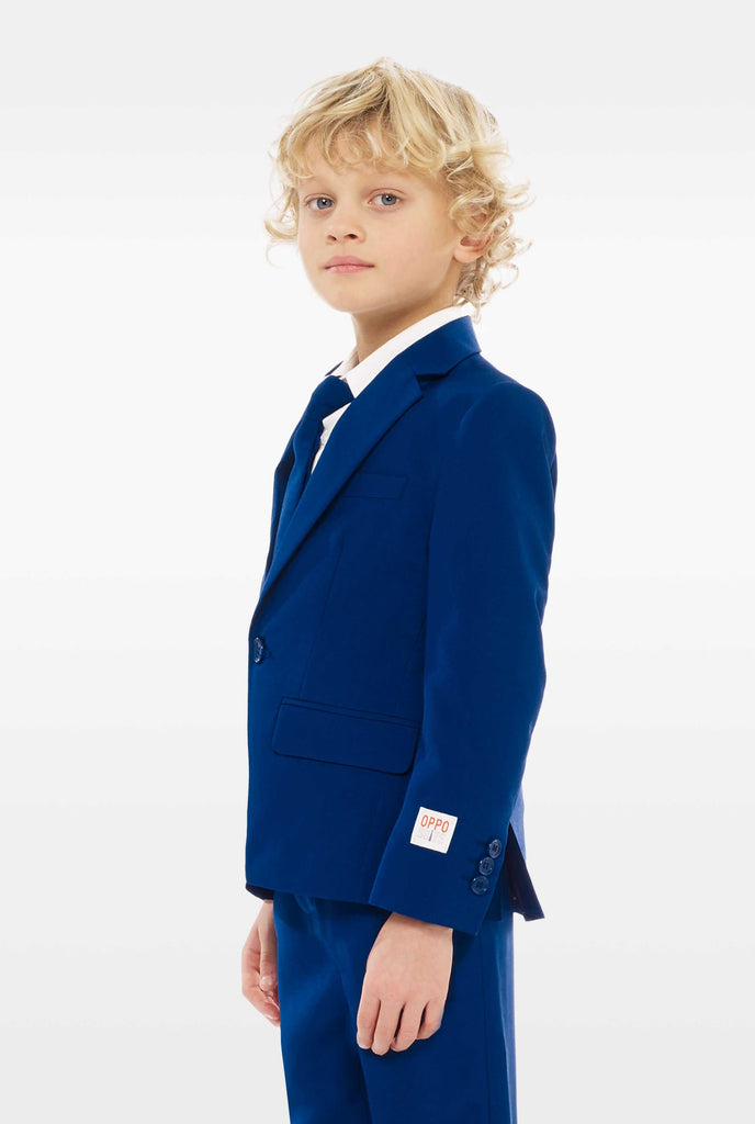 Dark blue suit for boys worn by boy