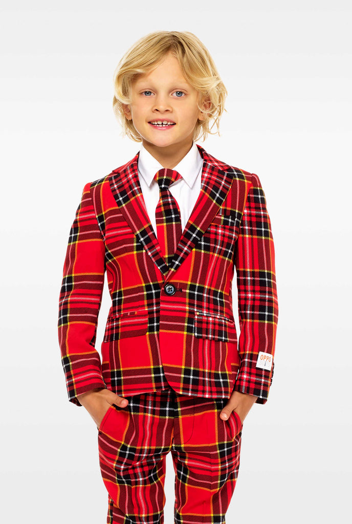 Red plaid suit for boys worn by boy