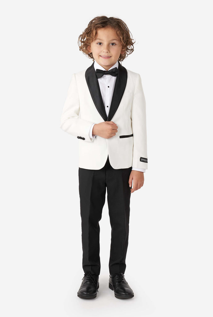 Kid wearing white and black tuxedo