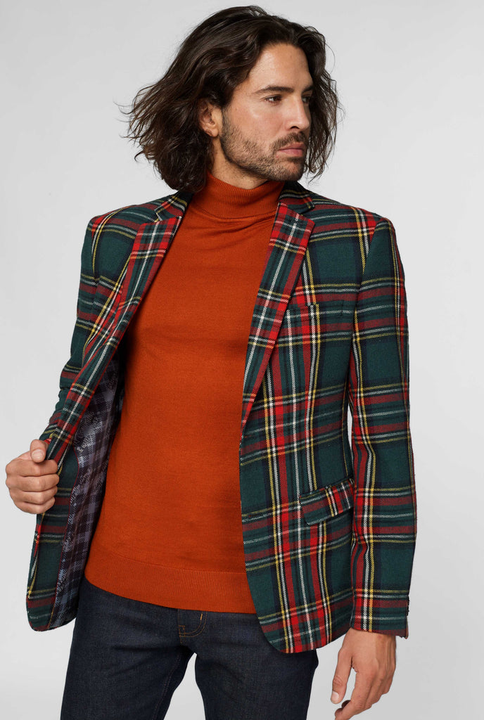 Red and green tartan blazer worn by man