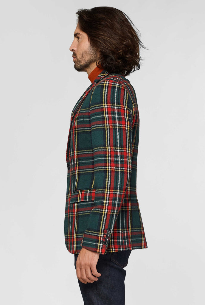 Red and green tartan blazer worn by man, view from the side