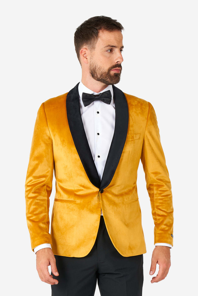 Man wearing golden velvet dinner jacket blazer