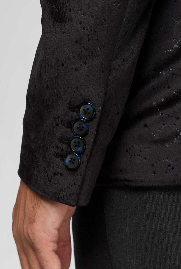 Black jacket with constellation pattern close up of sleeve