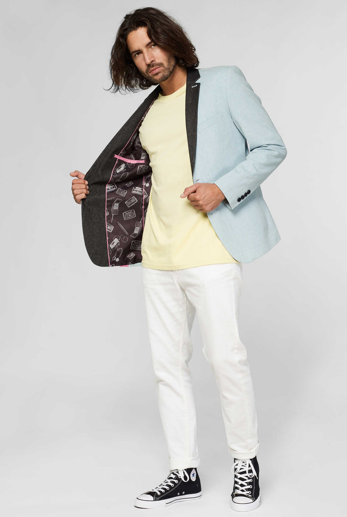 Blue casual blazer with white and pink lightning bolt worn by man showing inside of jacket