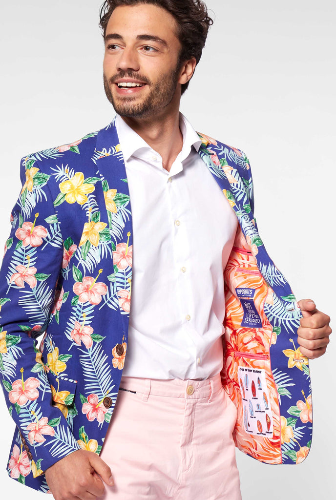 Blue blazer with flower print worn by man showing inside of jacket