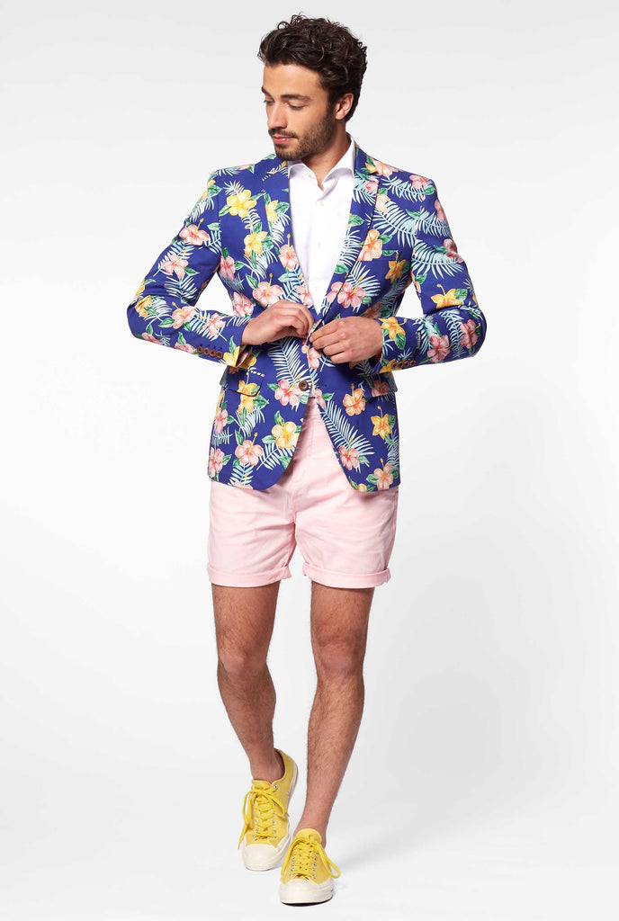 Blue blazer with flower print worn by man