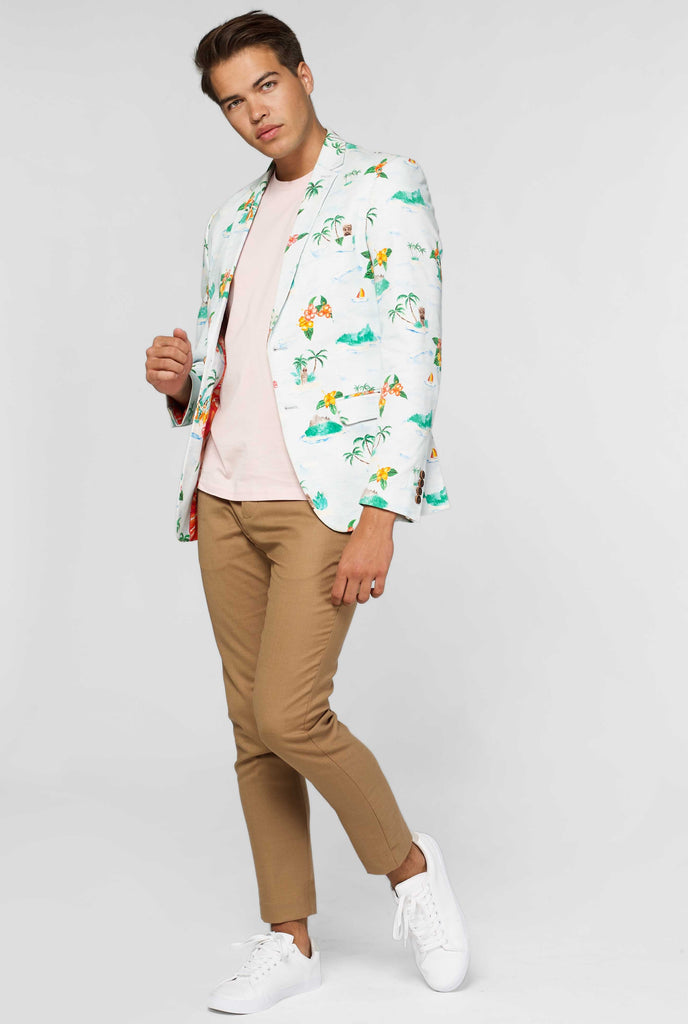 White casual blazer with Hawaiian icon print worn by man showing red palm tree inner lining