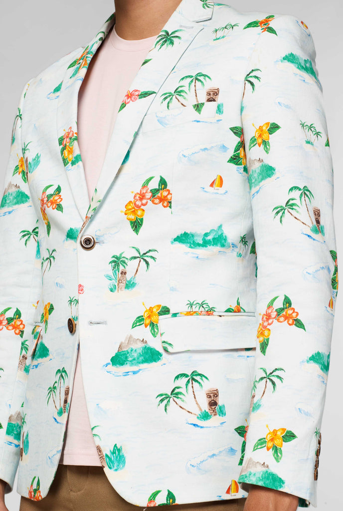 White blazer with Hawaiian icon print worn by man close up