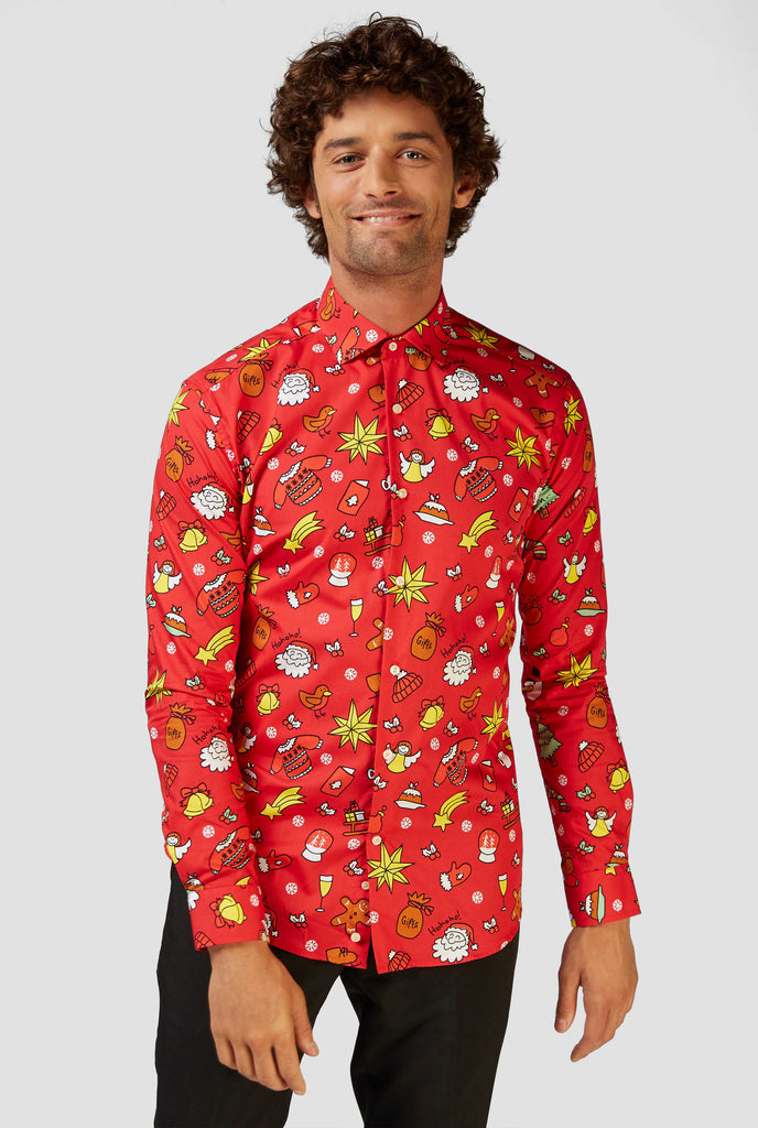 Man wearing red dress shirt with Christmas icons