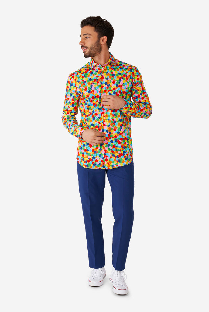 Man wearing multi color dress shirt with confetti print