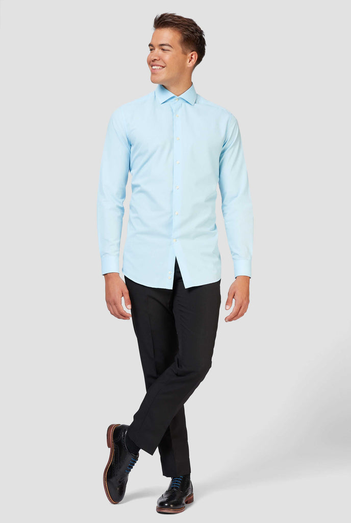 Man wearing light blue dress shirt