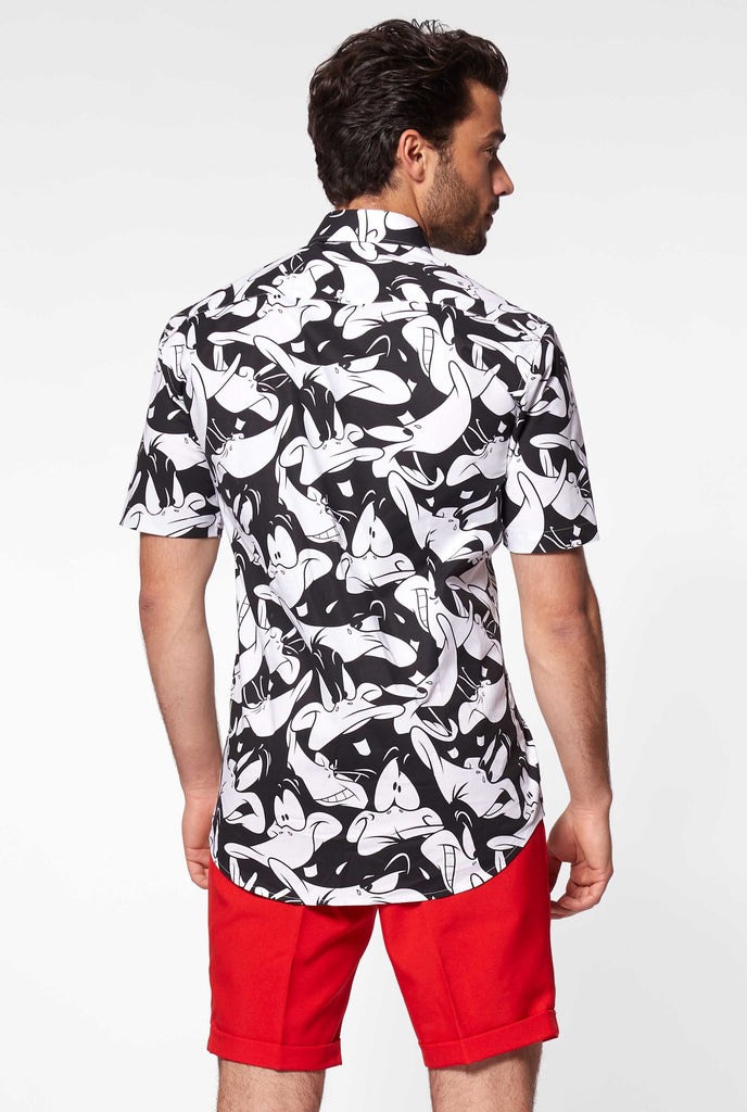 Man wearing summer shirt with Daffy Duck Looney Tunes print, view from the back