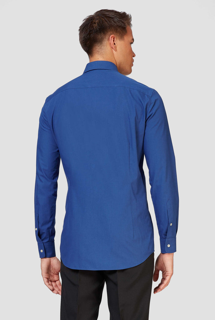 Man wearing dark blue dress shirt, view from the back