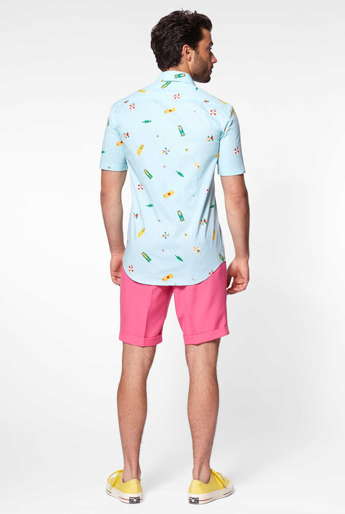 Man wearing summer shirt with pool icons, view from the back