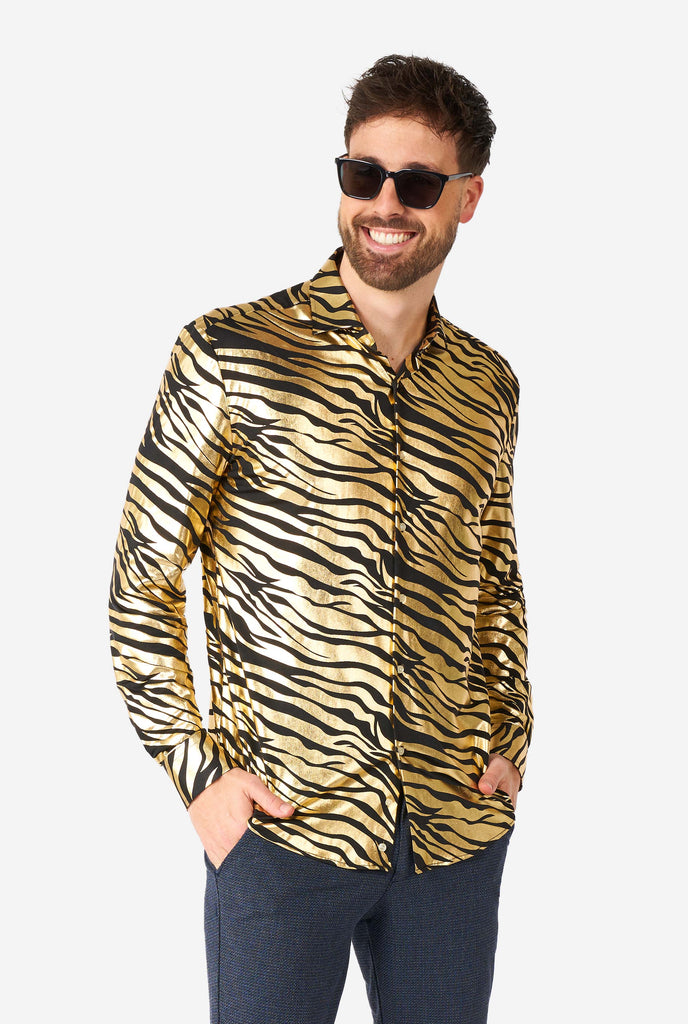 Man wearing golden dress shirt with tiger stripes