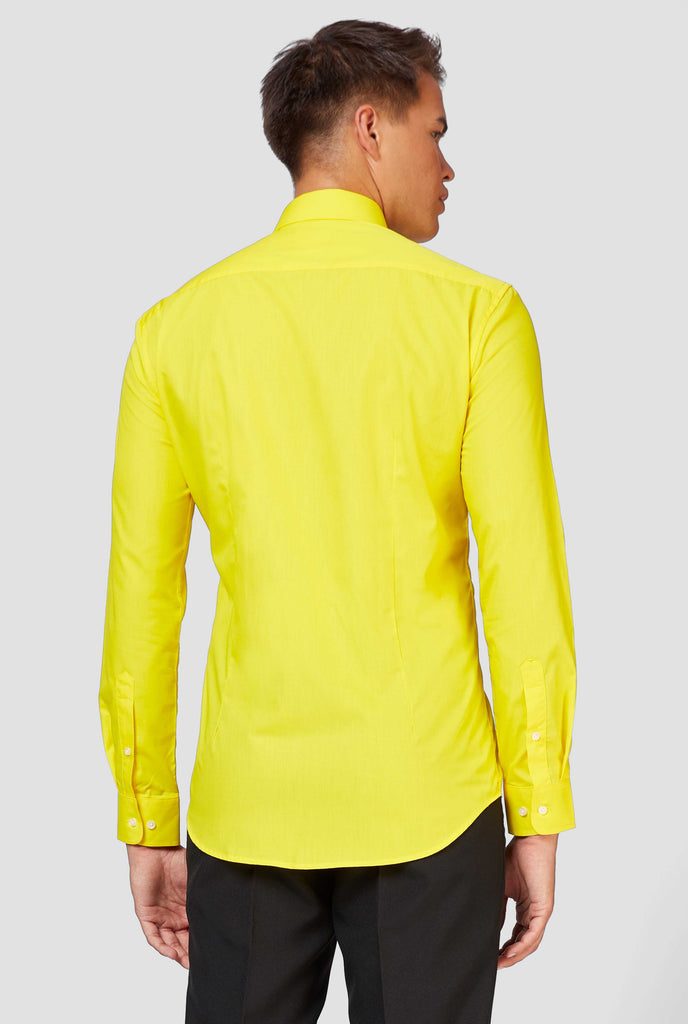 Man wearing yellow dress shirt, view from the back