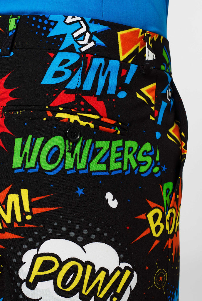 Black suit with comic book icons worn by man back side pocket pants