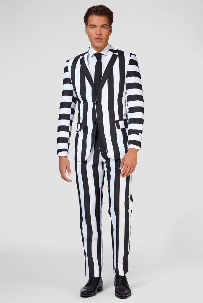 Black and white striped Beetlejuice men's suit worn by man