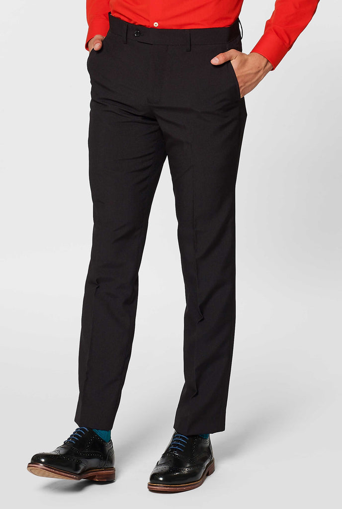 All black pants worn by man