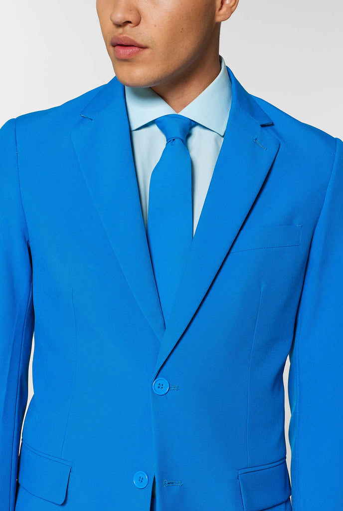 Man wearing blue men's suit, close up