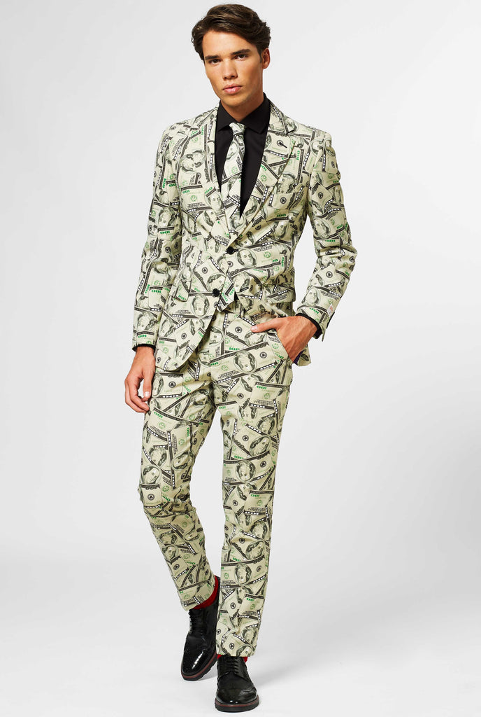 Man wearing men's suit with dollar, money print