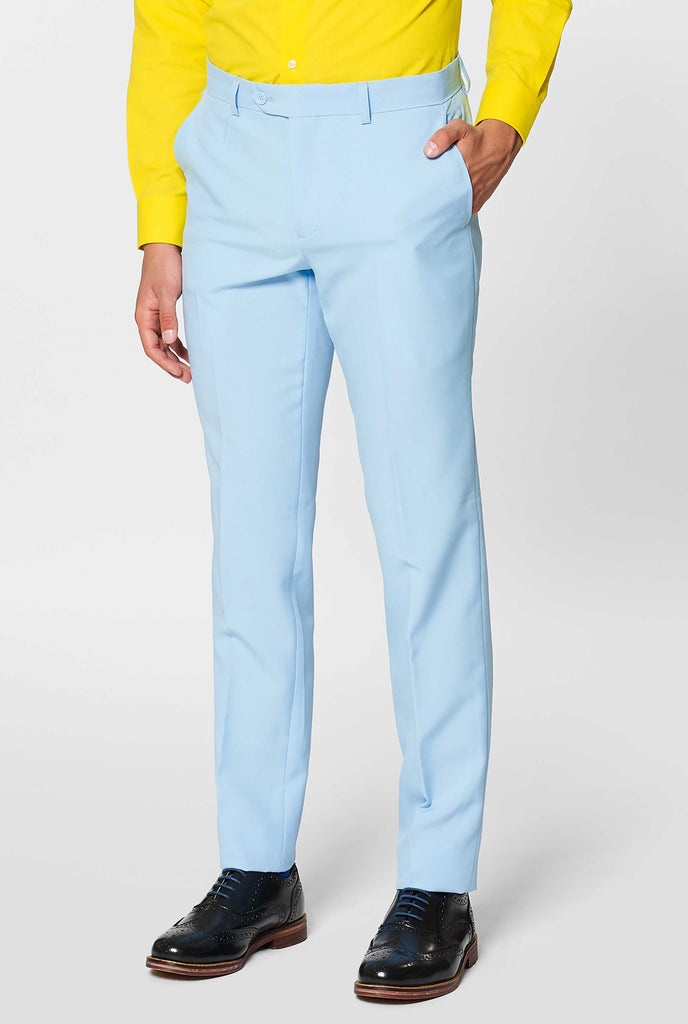 Man wearing light blue men's suit and yellow dress shirt, pants close up