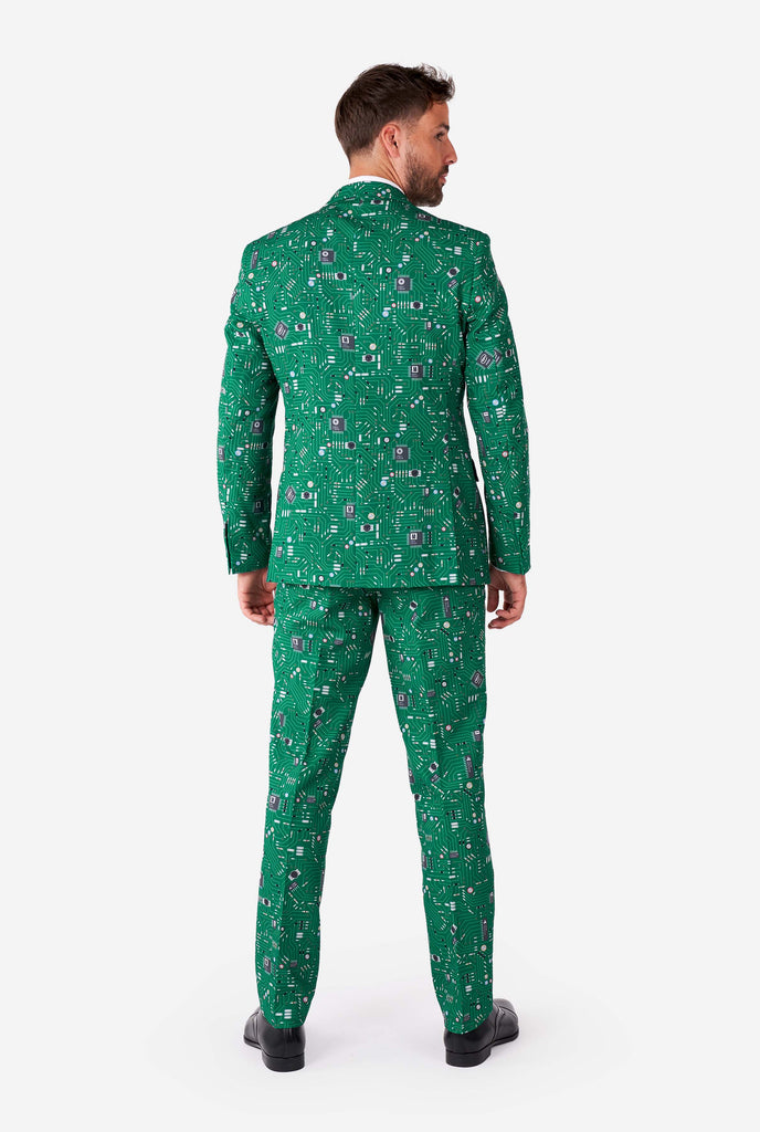 Man wearing men's suit with circuit board print view from the back