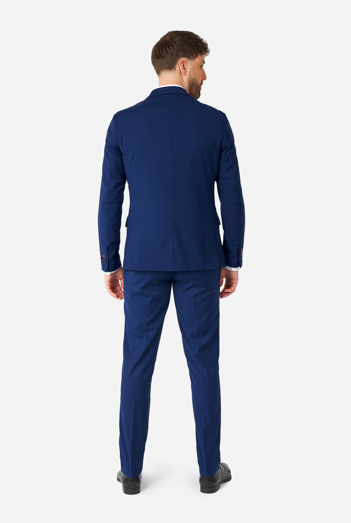 Man wearing casual blue business suit, view from the back