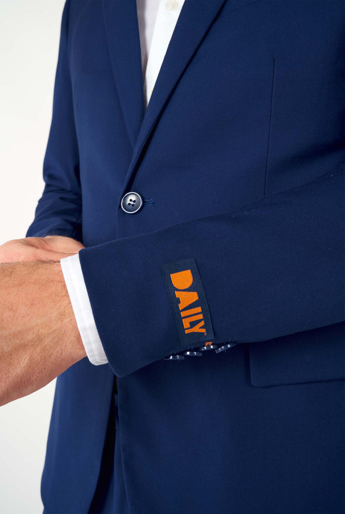 Man wearing casual blue business suit, close up