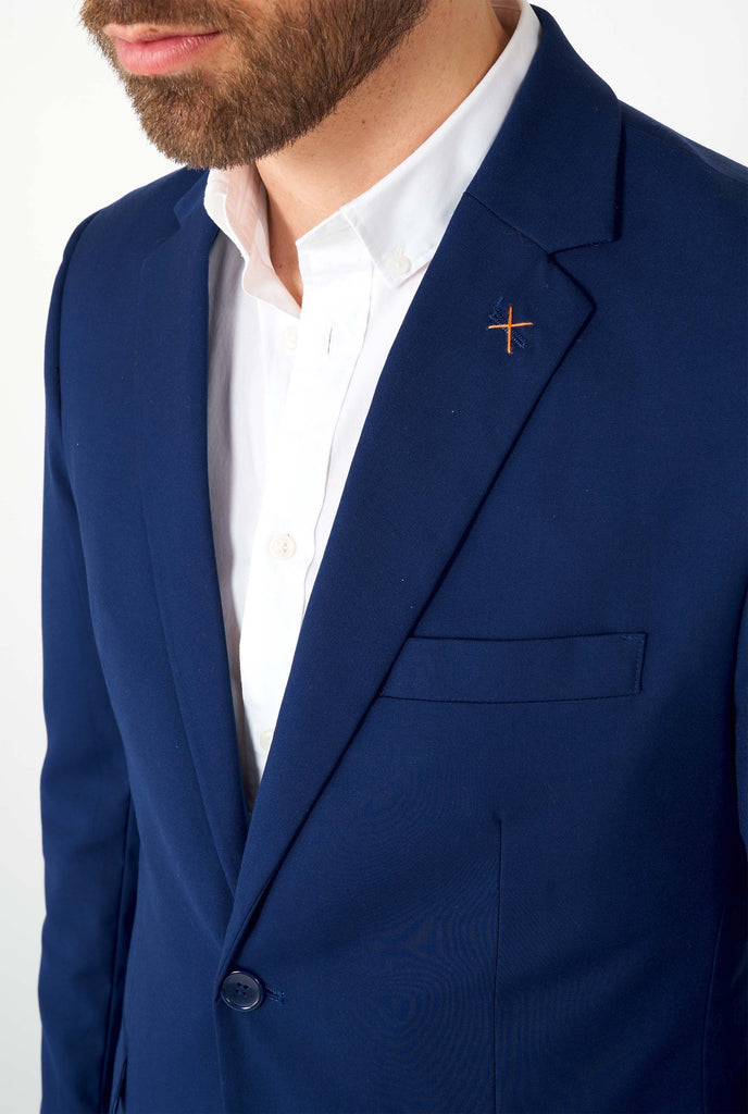 Man wearing casual blue business suit, close up