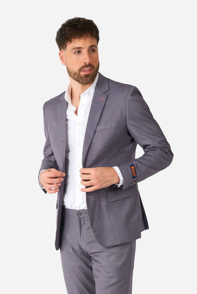 Man wearing casual grey business suit