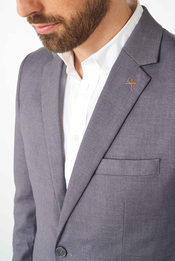 Man wearing casual grey business suit, close up