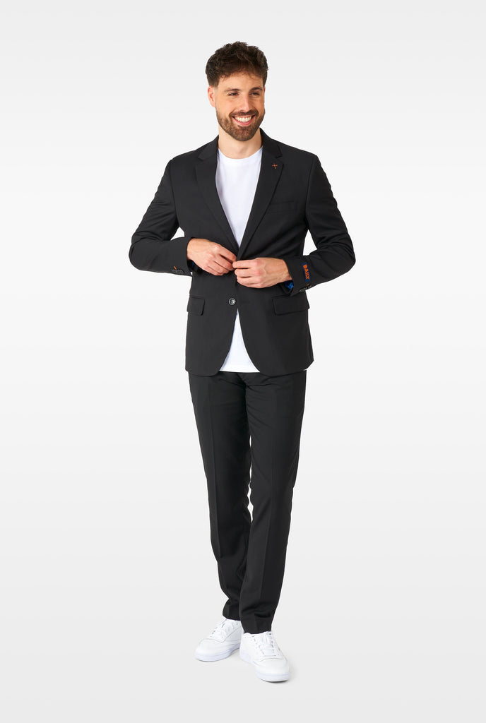 Man wearing casual black business suit