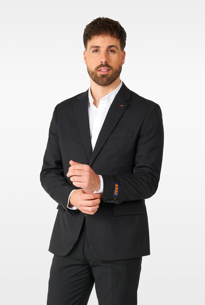 Man wearing casual black business suit