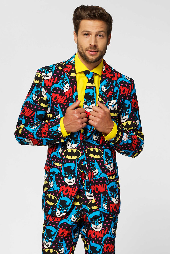 Batman themed men's suit with comic book icons worn by man