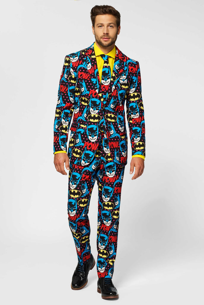 Batman themed men's suit with comic book icons worn by man