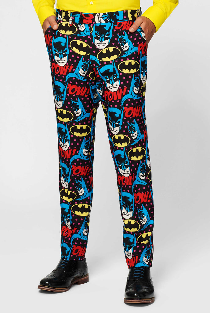 Batman themed men's suit with comic book icons worn by man